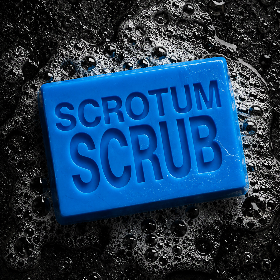 A rectangular blue bar of scrub labeled 'SCROTUM SCRUB' resting on a wet, bubbly black surface.
